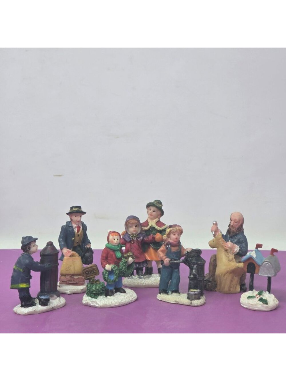 Hand-Painted Christmas Village Figurines 7-Piece Set Festive Holiday Decor